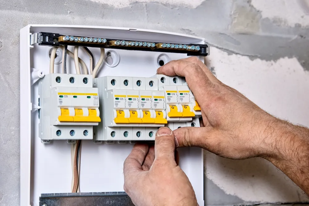 Licensed Hills District electrician upgrading a residential switchboard with RCDs and surge protection