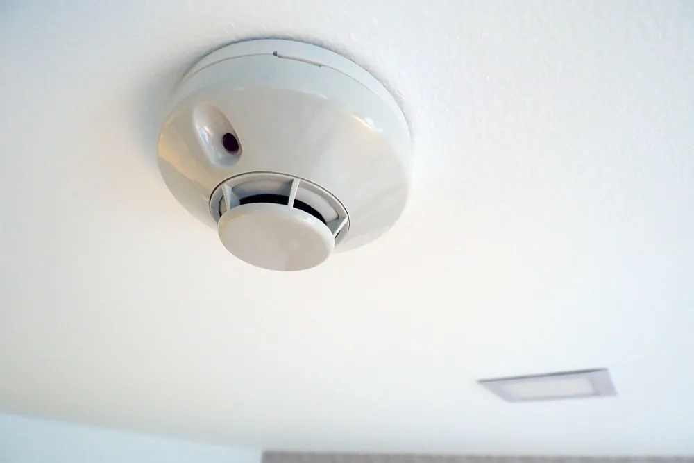 Kellyville electrician testing RCDs and interconnected smoke alarms for compliance